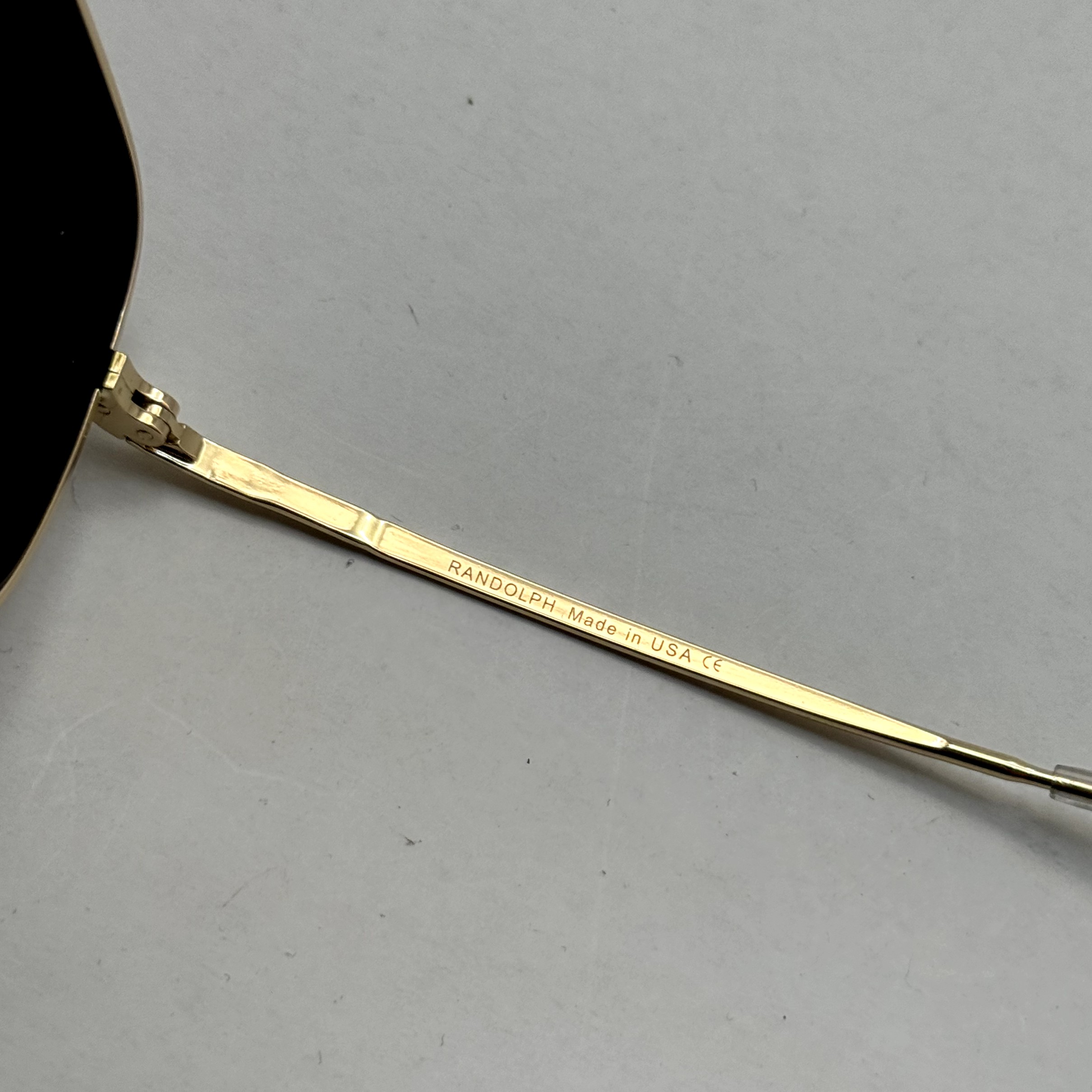 عینک آفتابی خلبانی رندولف شیشه سنگ آنتی رفلکس مشکی فریم طلایی فول پک RANDOLPH AVIATOR RE 58 24K GOLD