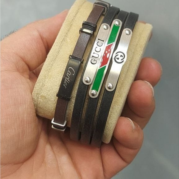 دستبند چرمی قفل و پلاک استیل مردانه طرح گوچی Gucci کیفیت چرم عالی تنوع طرح رنگ ثابت کد bn (پس کرایه)