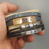 دستبند چرمی قفل و پلاک استیل مردانه کارتیر Cartier کیفیت چرم عالی تنوع طرح رنگ ثابت کد bn (پس کرایه)