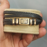 دستبند چرمی قفل و پلاک استیل مردانه کارتیر Cartier کیفیت چرم عالی تنوع طرح رنگ ثابت کد bn (پس کرایه)