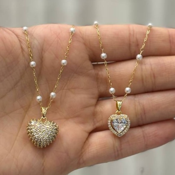 گردنبند و آویز پلاک مرواریدی طرح دایره و پاپیون آویز نگین تنوع طرح رنگ ثابت کد gy