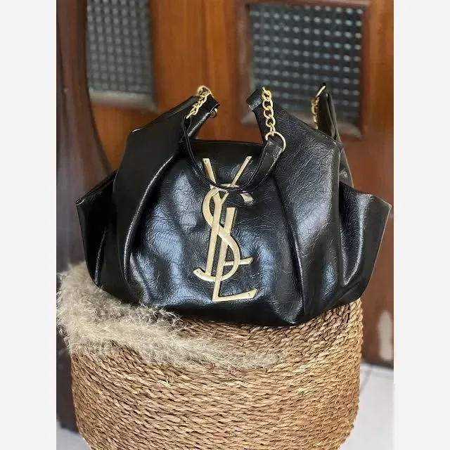 کیف زنانه یاشیل چرم مجلسی و اسپرت در دو رنگ مشکی و شکلاتی