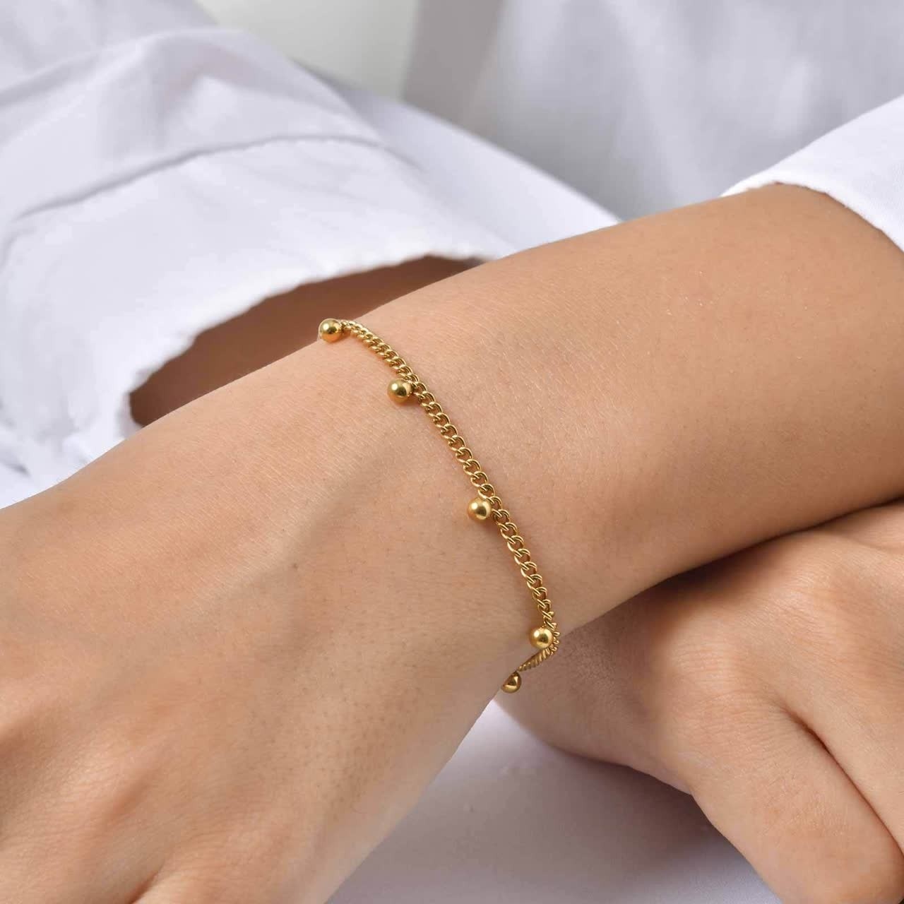 ست گردنبند و دستبند و پابند کارتیر گوی آویز