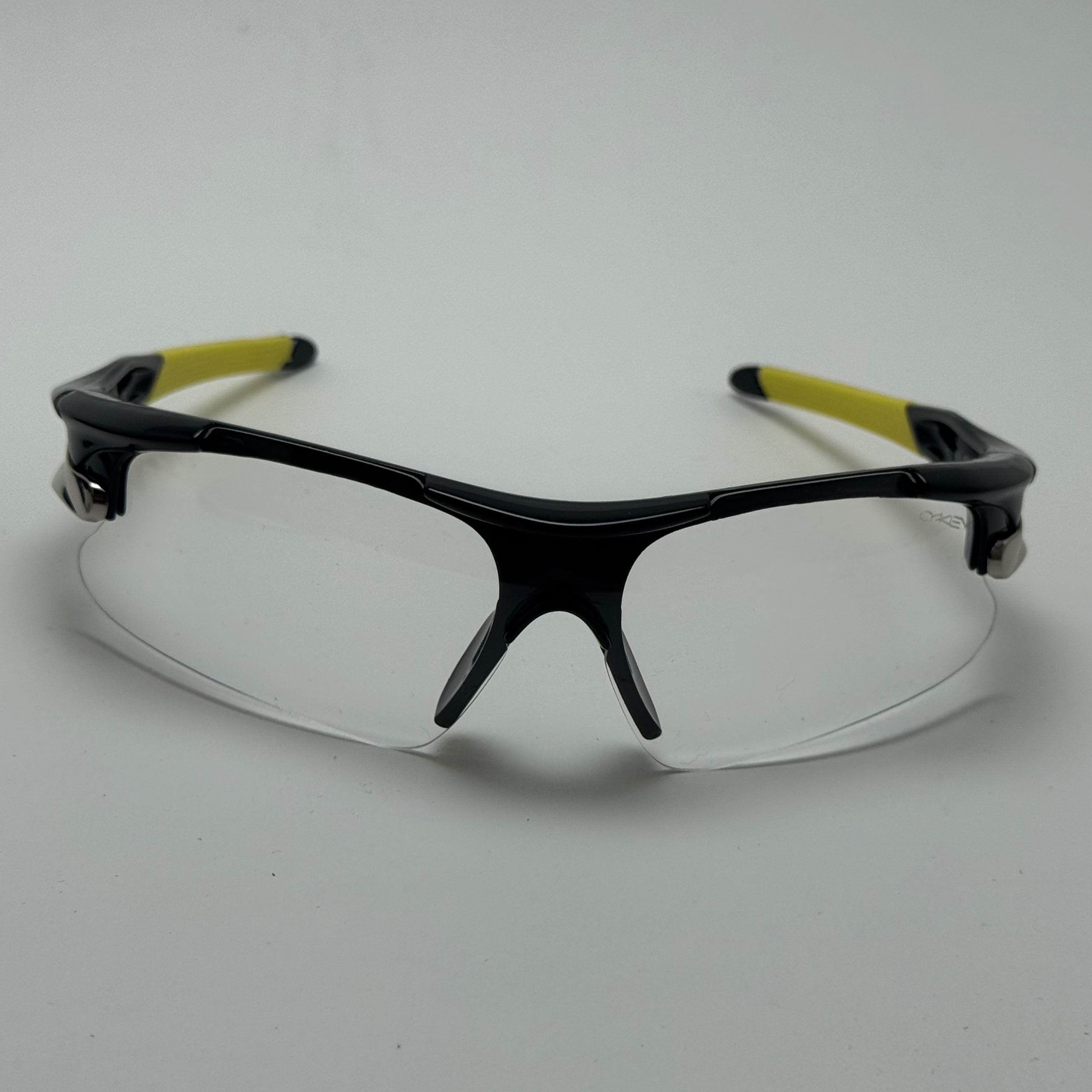 عینک شب اسپرت اوکلی Oakley مدلRadar عدسی بی رنگ فریم مشکی کد 806 - عینک طوفان - عینک شب
