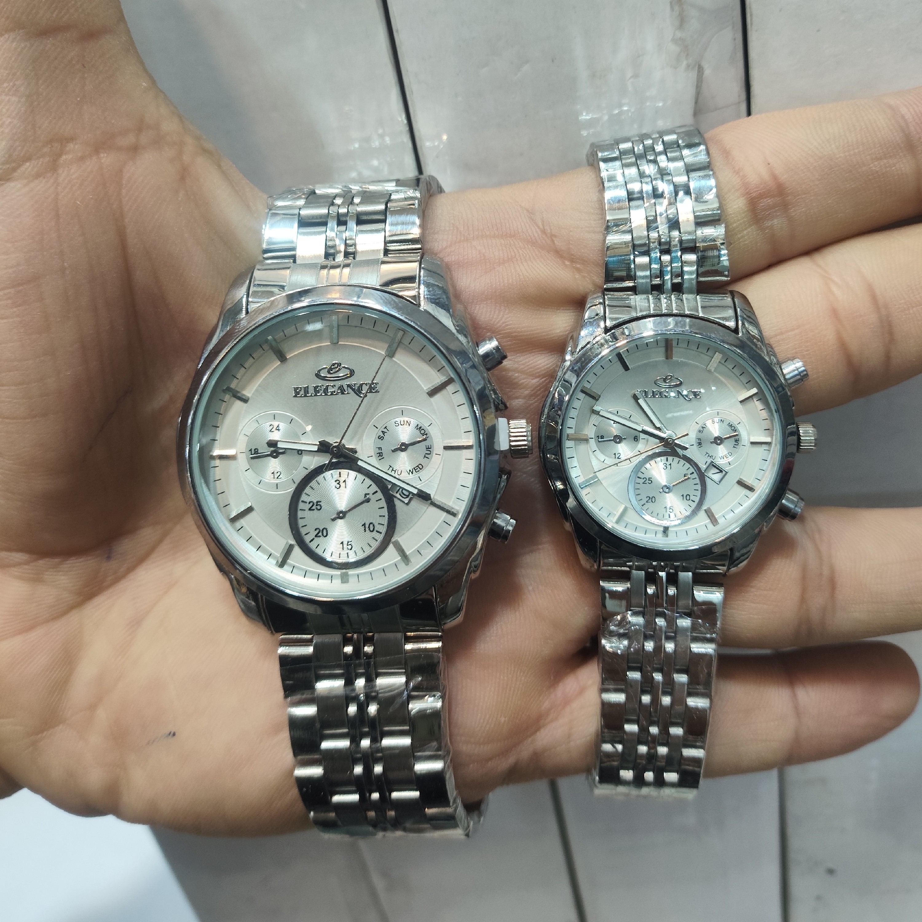 ساعت الگانس ست زنانه مردانه نقره ای صفحه سفید رنگ ثااابتت